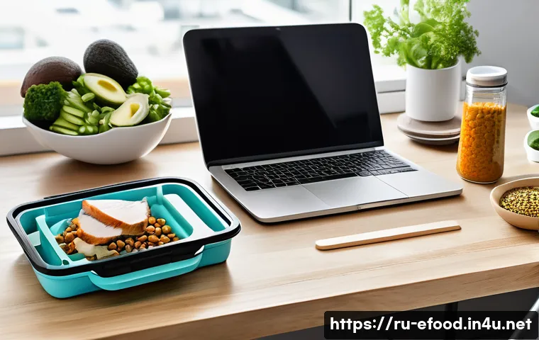 영양소 풍부한 간편식 - A neatly organized workspace with a portable lunchbox containing a balanced meal for a busy professi...